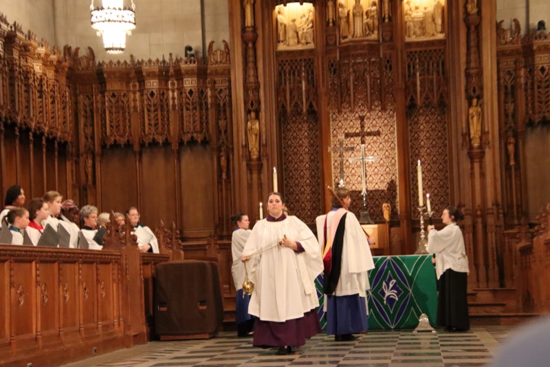 Thurifer and clergy at the altar in Duke Chapel