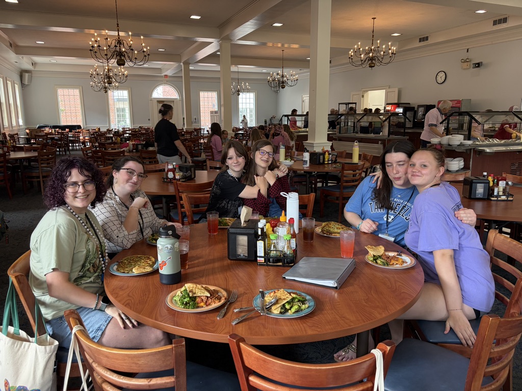 Choristers at a meal in the dining hall